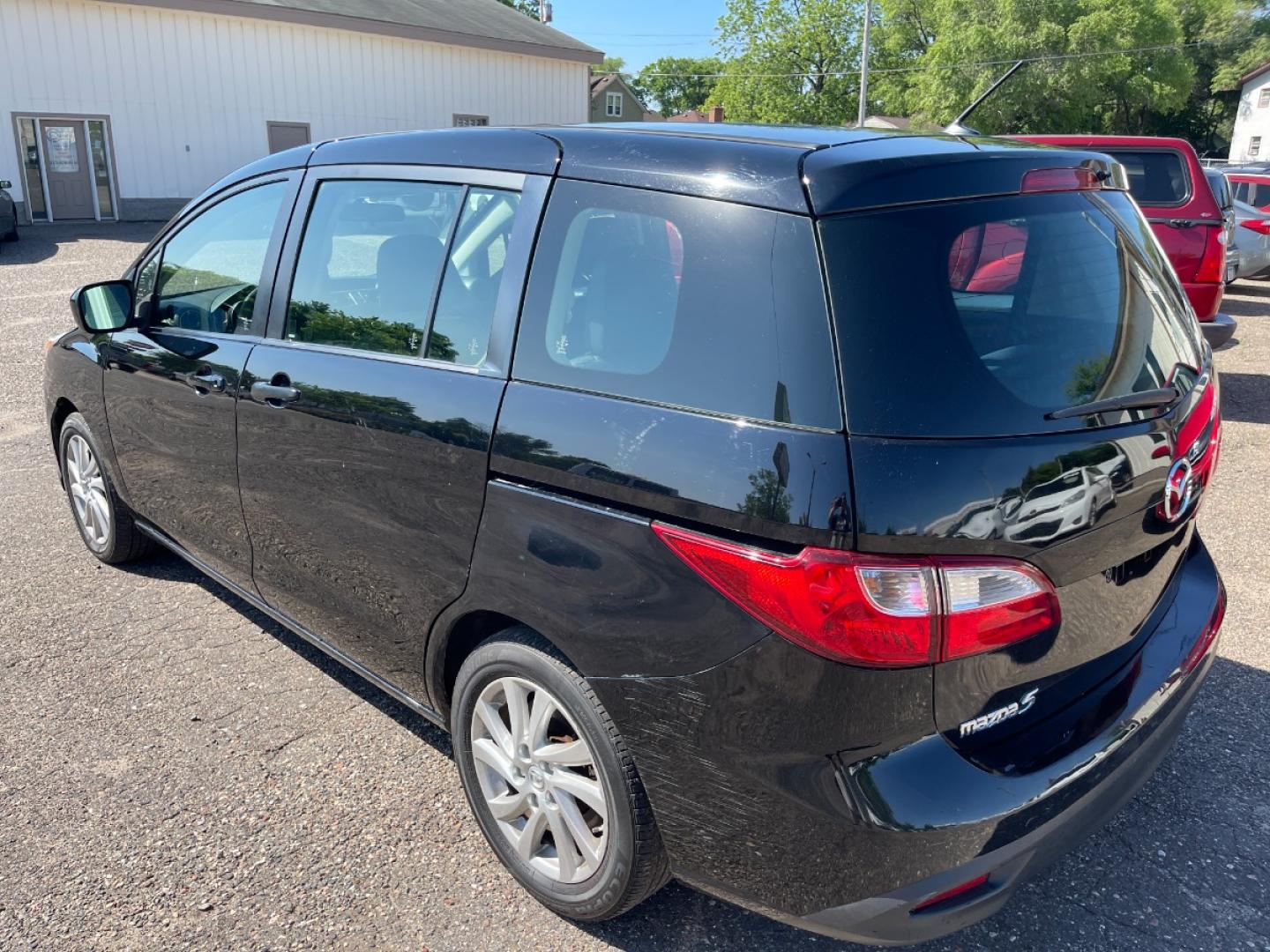 2012 BLACK /BLACK Mazda MAZDA5 Sport (JM1CW2BLXC0) with an 2.5L L4 DOHC 16V engine, AUTOMATIC transmission, located at 434 West Main Street, Anoka, MN, 55303, (763) 576-9696, 45.201759, -93.396706 - MULTI-POINT "PERFORMANCE" INSPECTION PERFORMED: Transmission/clutch, Engine performance, Brakes, Steering, Heater/Air Conditioning, Instruments/Controls, Headlights/fog lights, Brake/back-up lights, Interior/warning lights, Turn signals/flashers MULTI-POINT "UNDER HOOD" INSPECTION PERFORMED : F - Photo#6