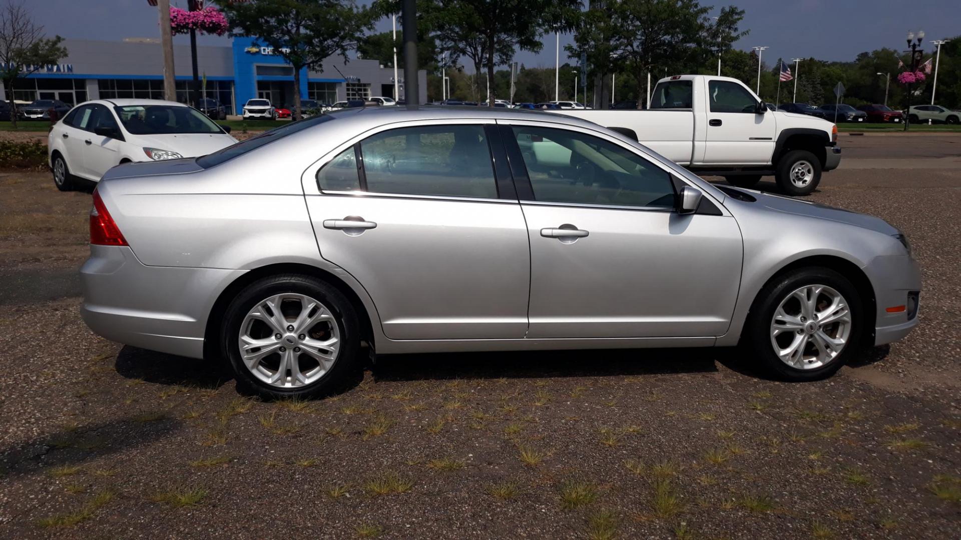 2012 /GRAY Ford Fusion SE (3FAHP0HA9CR) with an 2.5L L4 DOHC 16V engine, AUTO transmission, located at 434 West Main Street, Anoka, MN, 55303, (763) 576-9696, 45.201759, -93.396706 - 2012 FORD FUSION SE, 104,486 MILES, Air Conditioning; Power Windows; Power Locks; Power Steering; Tilt Wheel; AM/FM CD/MP3; Satellite; Immobilizer; Keyless Entry; Alarm; Available; Dual Front Airbags; Side Airbags; Head Airbags; Rear Head Airbags; Active Seatbelts; All Wheel ABS - Photo#1