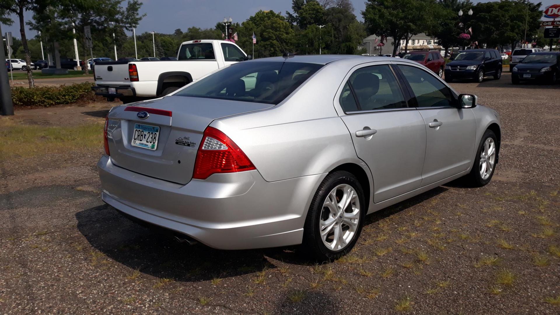 2012 /GRAY Ford Fusion SE (3FAHP0HA9CR) with an 2.5L L4 DOHC 16V engine, AUTO transmission, located at 434 West Main Street, Anoka, MN, 55303, (763) 576-9696, 45.201759, -93.396706 - 2012 FORD FUSION SE, 104,486 MILES, Air Conditioning; Power Windows; Power Locks; Power Steering; Tilt Wheel; AM/FM CD/MP3; Satellite; Immobilizer; Keyless Entry; Alarm; Available; Dual Front Airbags; Side Airbags; Head Airbags; Rear Head Airbags; Active Seatbelts; All Wheel ABS - Photo#4