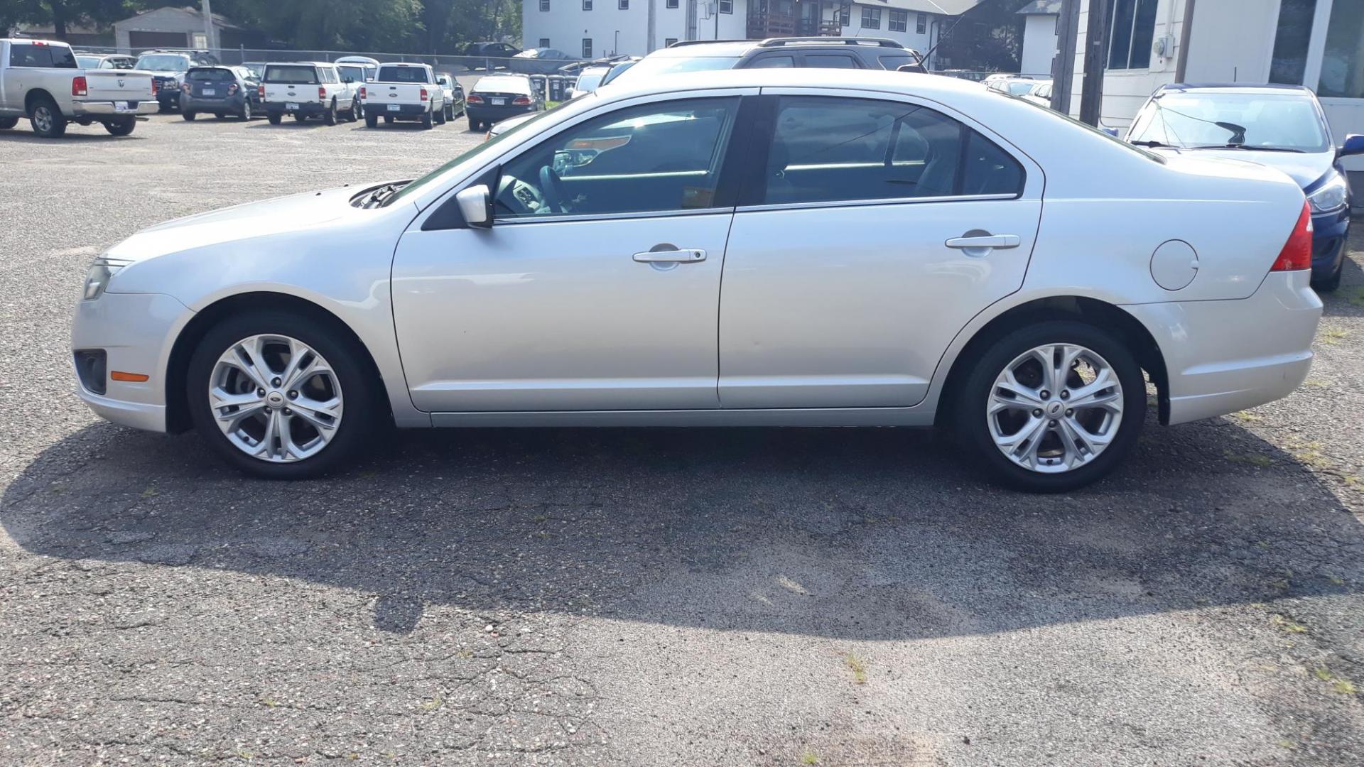 2012 /GRAY Ford Fusion SE (3FAHP0HA9CR) with an 2.5L L4 DOHC 16V engine, AUTO transmission, located at 434 West Main Street, Anoka, MN, 55303, (763) 576-9696, 45.201759, -93.396706 - 2012 FORD FUSION SE, 104,486 MILES, Air Conditioning; Power Windows; Power Locks; Power Steering; Tilt Wheel; AM/FM CD/MP3; Satellite; Immobilizer; Keyless Entry; Alarm; Available; Dual Front Airbags; Side Airbags; Head Airbags; Rear Head Airbags; Active Seatbelts; All Wheel ABS - Photo#7