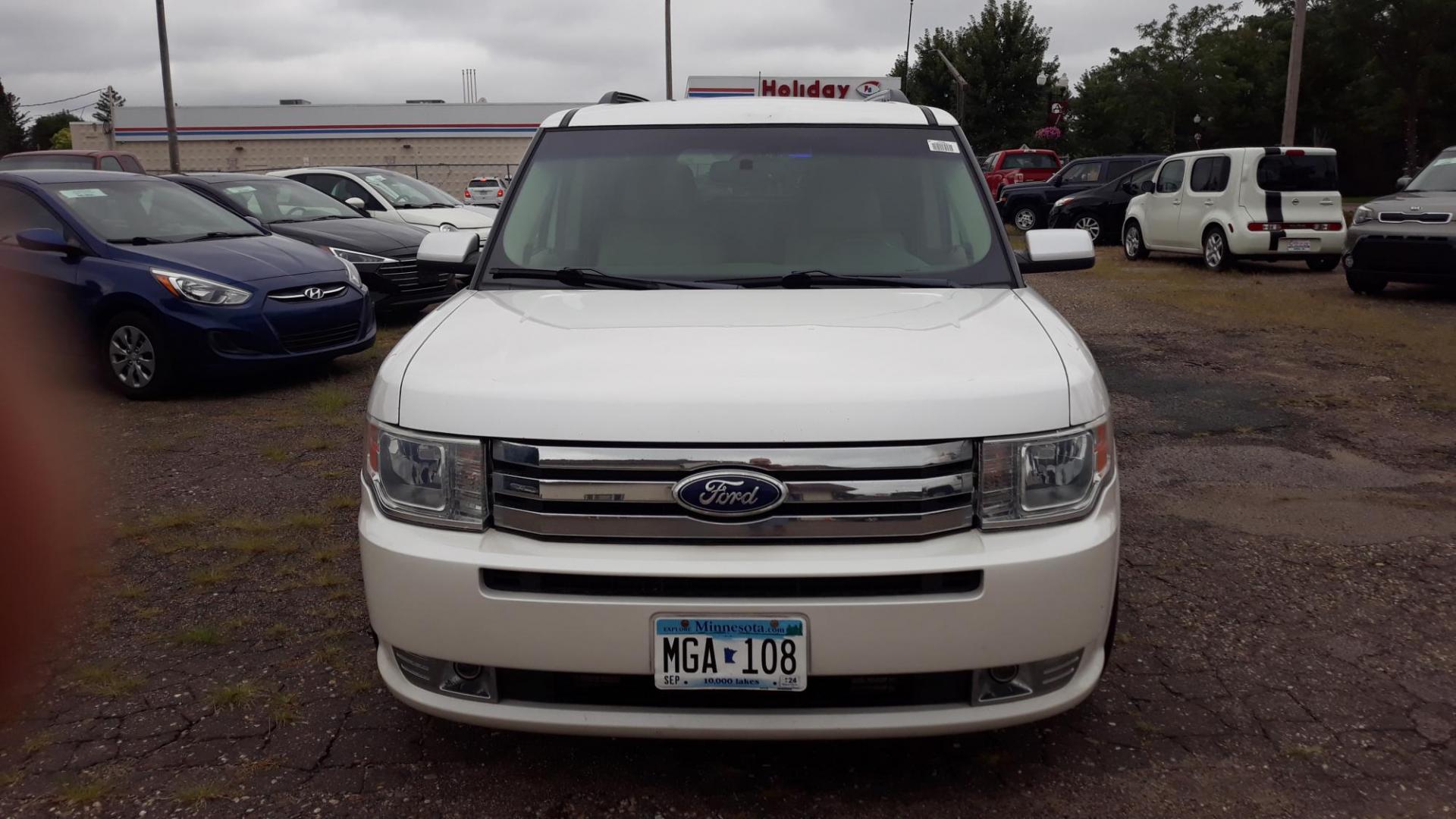 2012 /TAN Ford Flex SEL AWD (2FMHK6CC0CB) with an 3.5L V6 DOHC 24V engine, 6-Speed Automatic Overdrive transmission, located at 434 West Main Street, Anoka, MN, 55303, (763) 576-9696, 45.201759, -93.396706 - 2012 FORD FLEX SEL AWD, Air Conditioning; Power Windows; Power Locks; Power Steering; Tilt Wheel; AM/FM CD/MP3; Satellite; AM/FM CD/DVD; Sentry Key; Keyless Entry; Dual Front Airbags; Side Airbags; Head Airbags; Rear Head Airbags; Active Seatbelts; All Wheel ABS, 1-OWNER - Photo#1