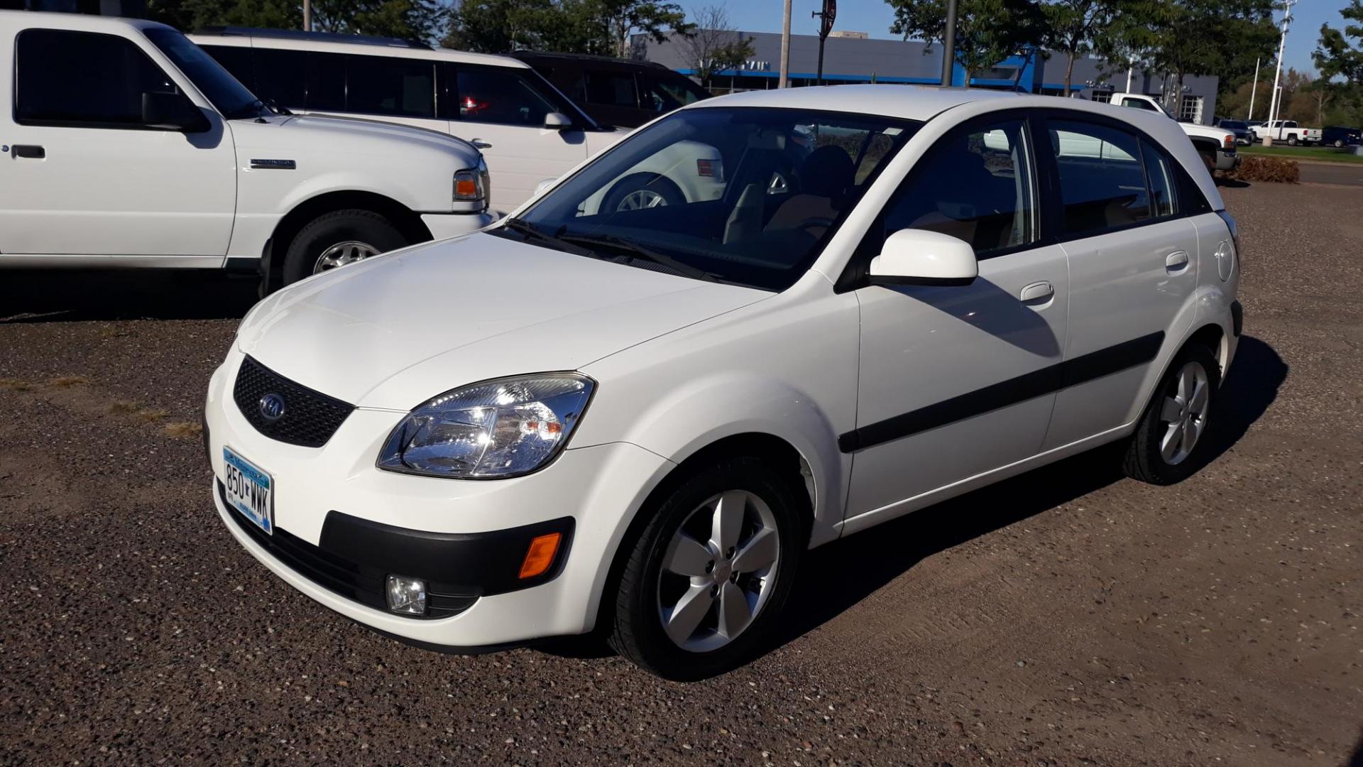 2009 WHITE /GRAY Kia Rio5 LX (KNADE243996) with an 2.7L V6 DOHC 24V engine, 5 speed Manual transmission, located at 434 West Main Street, Anoka, MN, 55303, (763) 576-9696, 45.201759, -93.396706 - 2009 KIA RIO 5SX, 2-OWNERS AND NO ACCIDENTS WITH ONLY 91,000 ACTUAL MILES , THIS IS A GREAT LITTLE CAR WITH A NEW CLUTCH AND SAFTY CHECKED. - Photo#0