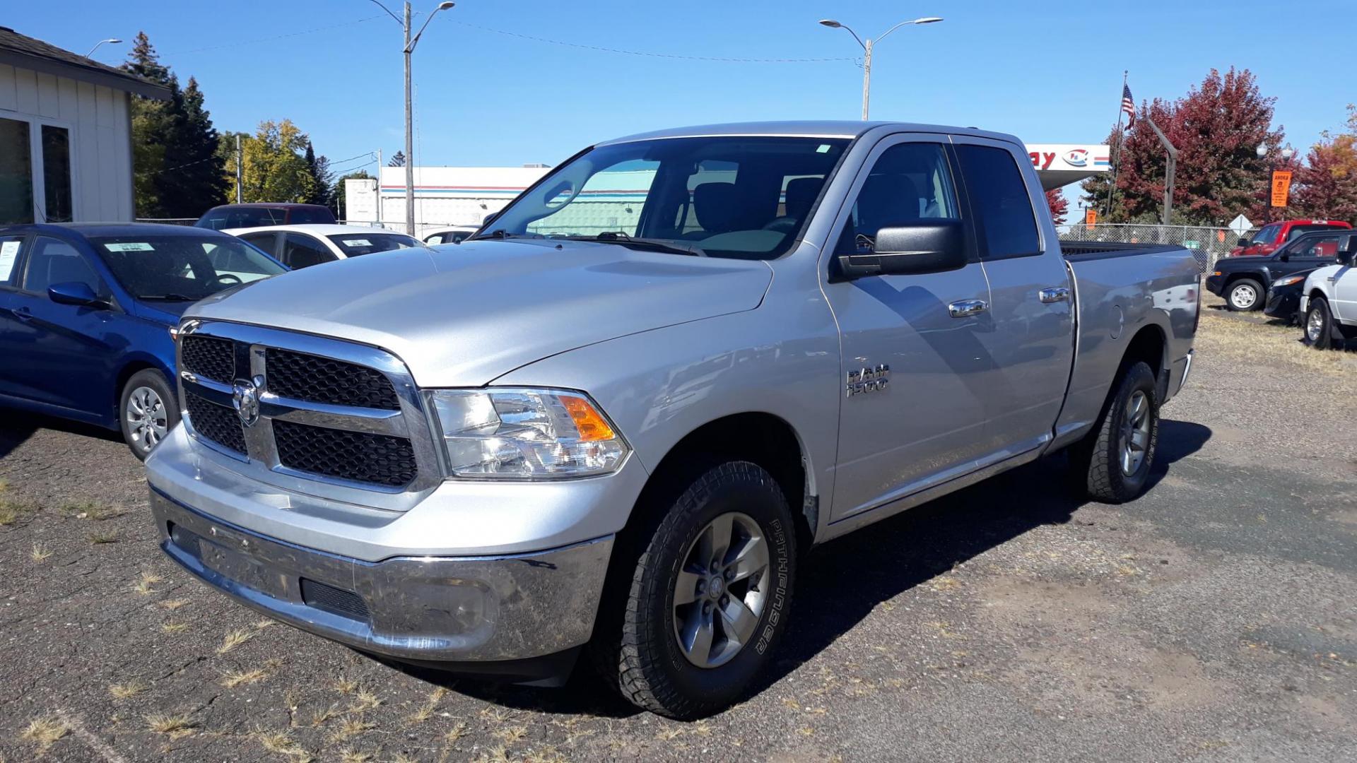 2017 SILVER /GRAY RAM 1500 SLT Quad Cab 4WD (1C6RR7GG1HS) with an 3.6L V6 DOHC 24V FFV engine, 8A transmission, located at 434 West Main Street, Anoka, MN, 55303, (763) 576-9696, 45.201759, -93.396706 - Photo#0