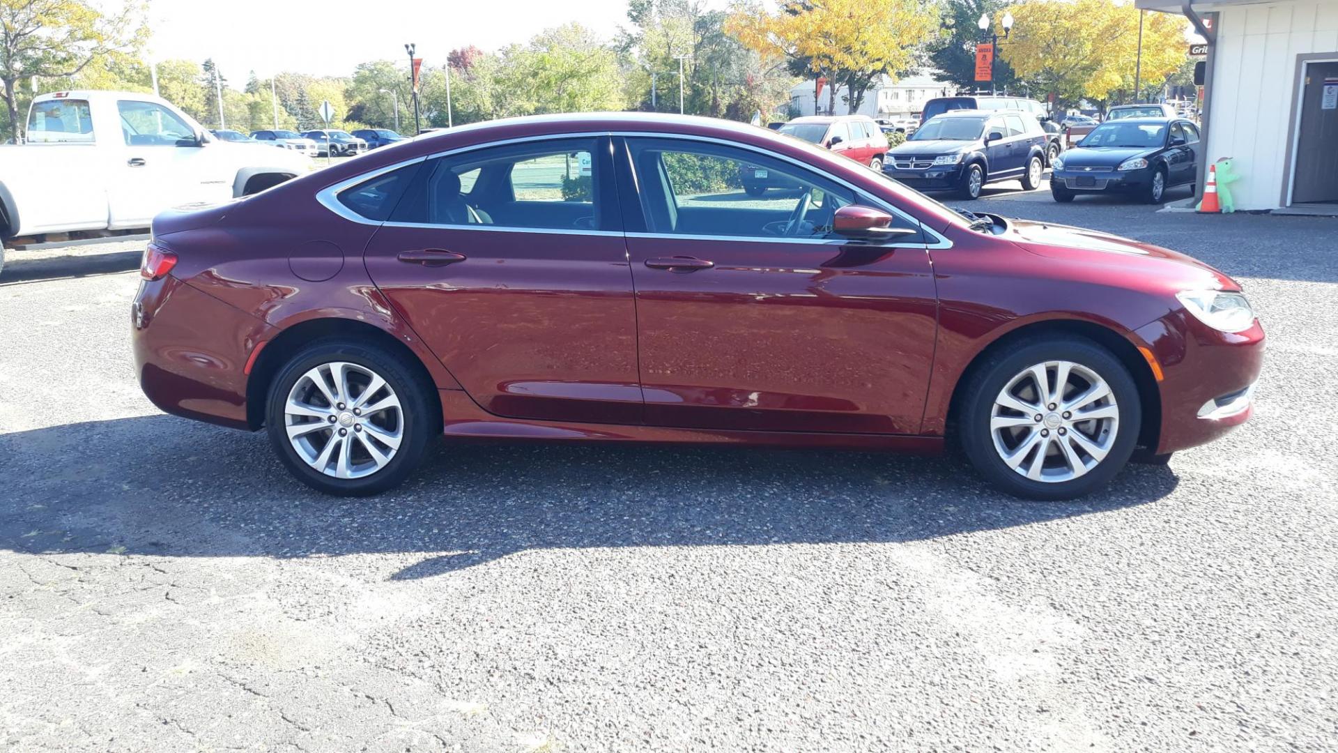 2016 RED /GRAY Chrysler 200 Limited (1C3CCCAB4GN) with an 2.4L L4 DOHC 16V engine, 9A transmission, located at 434 West Main Street, Anoka, MN, 55303, (763) 576-9696, 45.201759, -93.396706 - 2016 CHRYSLER 200 LIMITED, Air Conditioning; Power Windows; Power Locks; Power Steering; Tilt Wheel; AM/FM CD/MP3; Satellite; Sentry Key; Keyless Entry; Alarm; Available; Dual Airbags Front Head and Side; Active Seatbelts; Dual Rear Side Airbags; All Wheel ABS - Photo#3