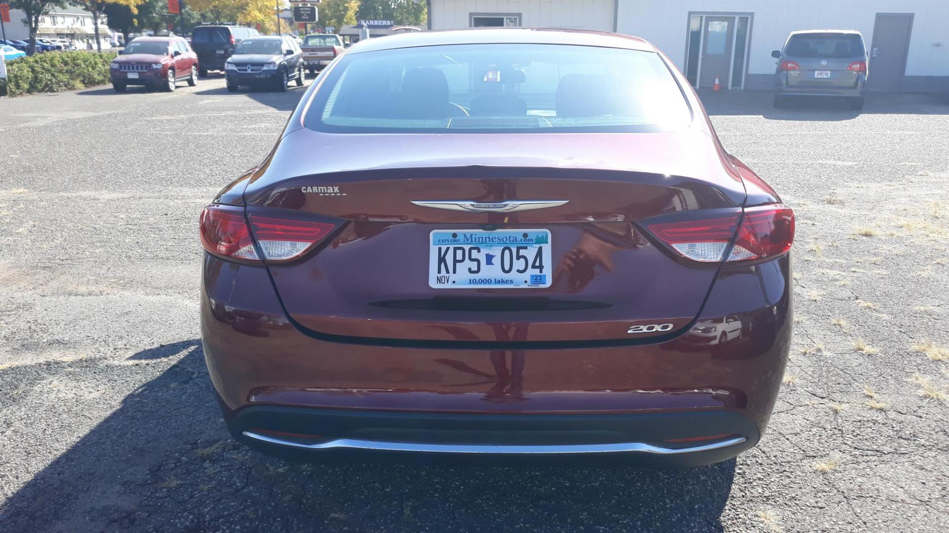 2016 RED /GRAY Chrysler 200 Limited (1C3CCCAB4GN) with an 2.4L L4 DOHC 16V engine, 9A transmission, located at 434 West Main Street, Anoka, MN, 55303, (763) 576-9696, 45.201759, -93.396706 - 2016 CHRYSLER 200 LIMITED, Air Conditioning; Power Windows; Power Locks; Power Steering; Tilt Wheel; AM/FM CD/MP3; Satellite; Sentry Key; Keyless Entry; Alarm; Available; Dual Airbags Front Head and Side; Active Seatbelts; Dual Rear Side Airbags; All Wheel ABS - Photo#5