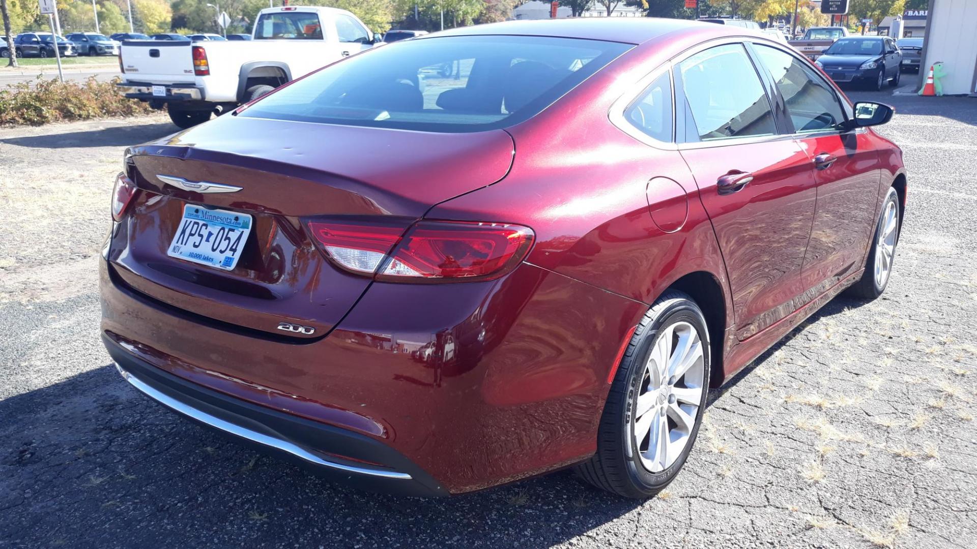 2016 RED /GRAY Chrysler 200 Limited (1C3CCCAB4GN) with an 2.4L L4 DOHC 16V engine, 9A transmission, located at 434 West Main Street, Anoka, MN, 55303, (763) 576-9696, 45.201759, -93.396706 - 2016 CHRYSLER 200 LIMITED, Air Conditioning; Power Windows; Power Locks; Power Steering; Tilt Wheel; AM/FM CD/MP3; Satellite; Sentry Key; Keyless Entry; Alarm; Available; Dual Airbags Front Head and Side; Active Seatbelts; Dual Rear Side Airbags; All Wheel ABS - Photo#4