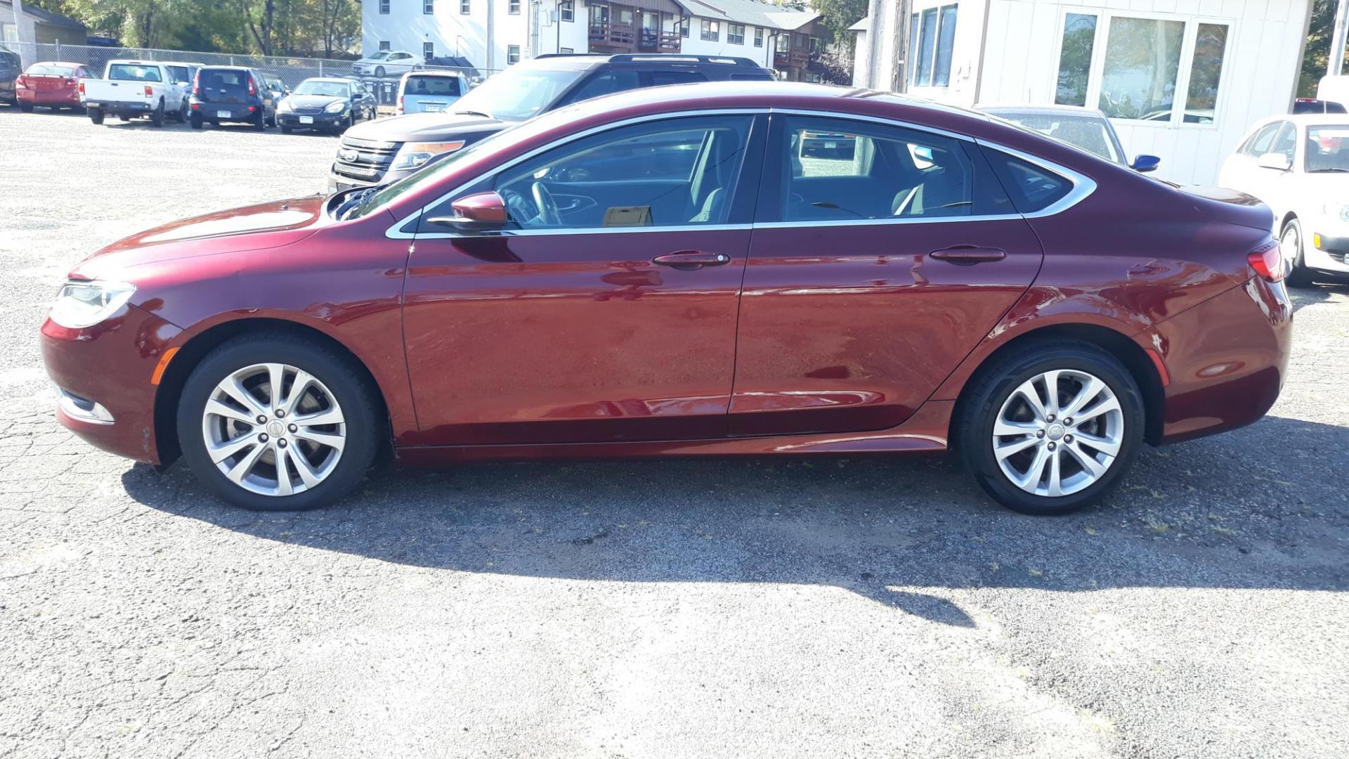 2016 RED /GRAY Chrysler 200 Limited (1C3CCCAB4GN) with an 2.4L L4 DOHC 16V engine, 9A transmission, located at 434 West Main Street, Anoka, MN, 55303, (763) 576-9696, 45.201759, -93.396706 - 2016 CHRYSLER 200 LIMITED, Air Conditioning; Power Windows; Power Locks; Power Steering; Tilt Wheel; AM/FM CD/MP3; Satellite; Sentry Key; Keyless Entry; Alarm; Available; Dual Airbags Front Head and Side; Active Seatbelts; Dual Rear Side Airbags; All Wheel ABS - Photo#7