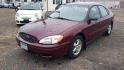 2006 RED /GRAY Ford Taurus SE (1FAFP53U36A) with an 3.0L V6 OHV 12V engine, 4-Speed Automatic Overdrive transmission, located at 434 West Main Street, Anoka, MN, 55303, (763) 576-9696, 45.201759, -93.396706 - 2006 FORD TAURUS, 3.0 V6, WITH ONLY 122,522 MILES - Photo#0