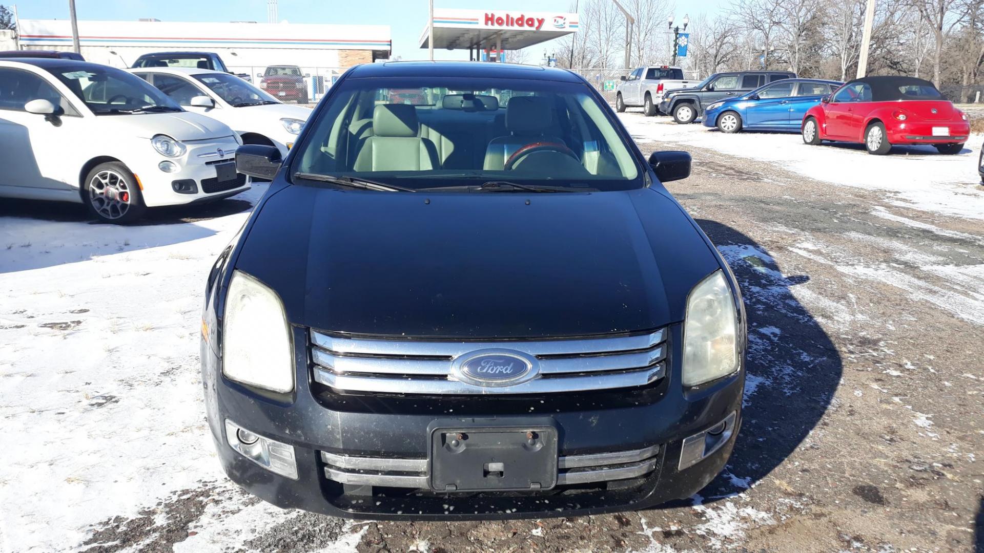 2006 BLACK /GRAY Ford Fusion V6 SEL (3FAHP08126R) with an 3.0L V6 DOHC 24V engine, 6-Speed Automatic Overdrive transmission, located at 434 West Main Street, Anoka, MN, 55303, (763) 576-9696, 45.201759, -93.396706 - 2006 FORD FUSION SEL , CHEAP TRANSPORTATION, LOOKS GOOD AND RUNS GOOD. - Photo#3