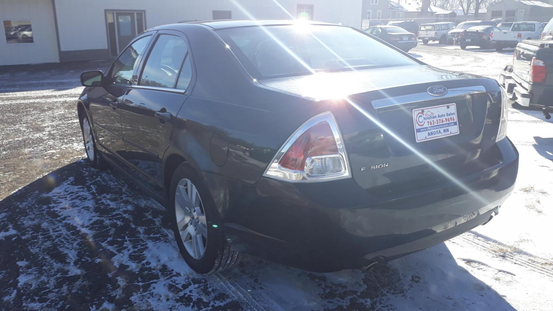 2006 BLACK /GRAY Ford Fusion V6 SEL (3FAHP08126R) with an 3.0L V6 DOHC 24V engine, 6-Speed Automatic Overdrive transmission, located at 434 West Main Street, Anoka, MN, 55303, (763) 576-9696, 45.201759, -93.396706 - 2006 FORD FUSION SEL , CHEAP TRANSPORTATION, LOOKS GOOD AND RUNS GOOD. - Photo#5