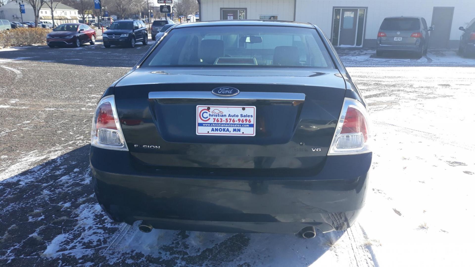 2006 BLACK /GRAY Ford Fusion V6 SEL (3FAHP08126R) with an 3.0L V6 DOHC 24V engine, 6-Speed Automatic Overdrive transmission, located at 434 West Main Street, Anoka, MN, 55303, (763) 576-9696, 45.201759, -93.396706 - 2006 FORD FUSION SEL , CHEAP TRANSPORTATION, LOOKS GOOD AND RUNS GOOD. - Photo#6