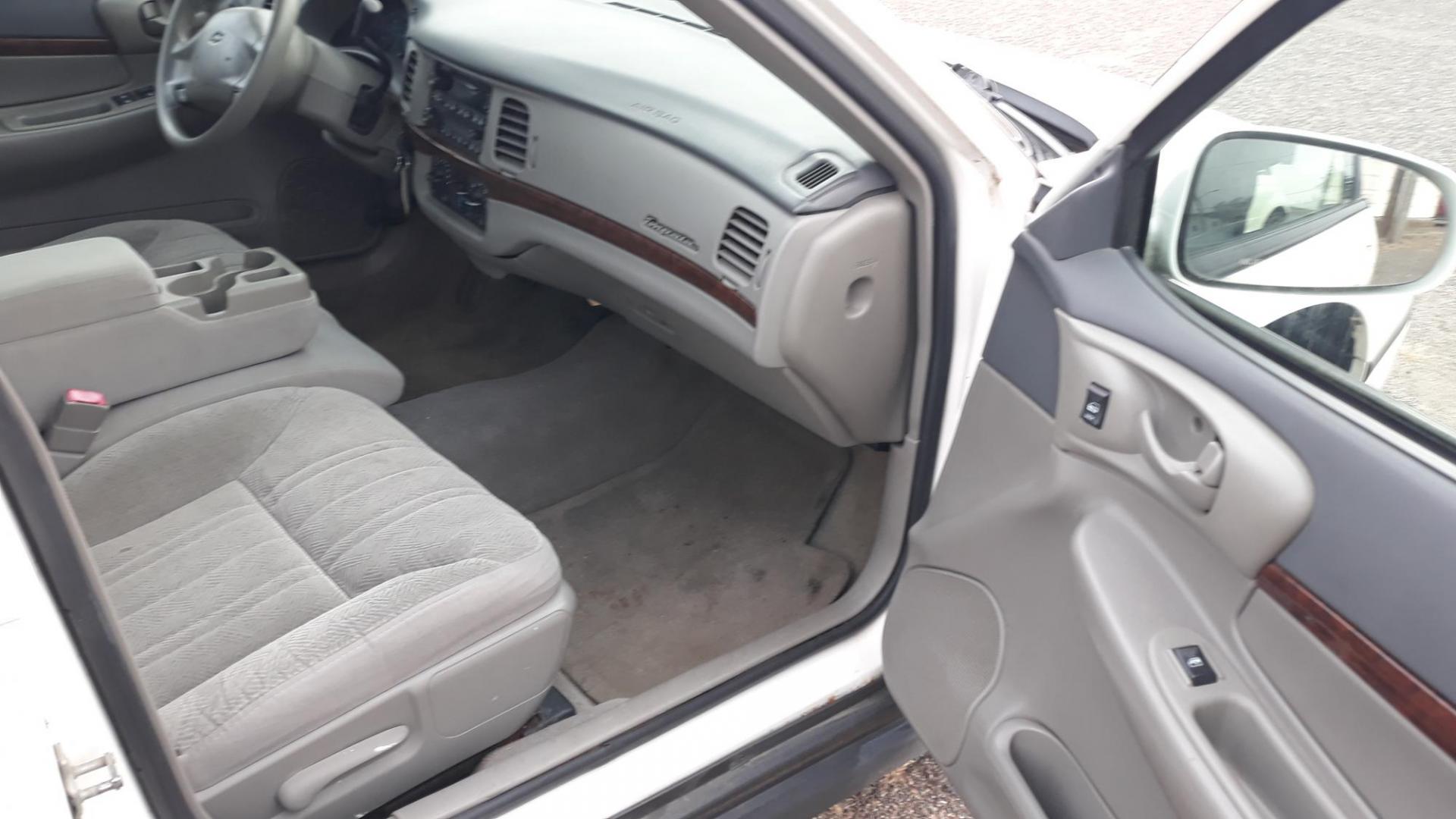 2005 WHITE /GRAY Chevrolet Impala Base (2G1WF52E759) with an 3.4L V6 OHV 12V engine, 4-Speed Automatic Overdrive transmission, located at 434 West Main Street, Anoka, MN, 55303, (763) 576-9696, 45.201759, -93.396706 - 2005 CHEVROLET IMPALA, Air Conditioning; Power Windows; Power Locks; Power Steering; Tilt Wheel; AM/FM Cassette; AM/FM CD; Pass Key Security; Daytime Running Lights; Dual Front Air Bag; Active Belts; All Wheel ABS - Photo#12