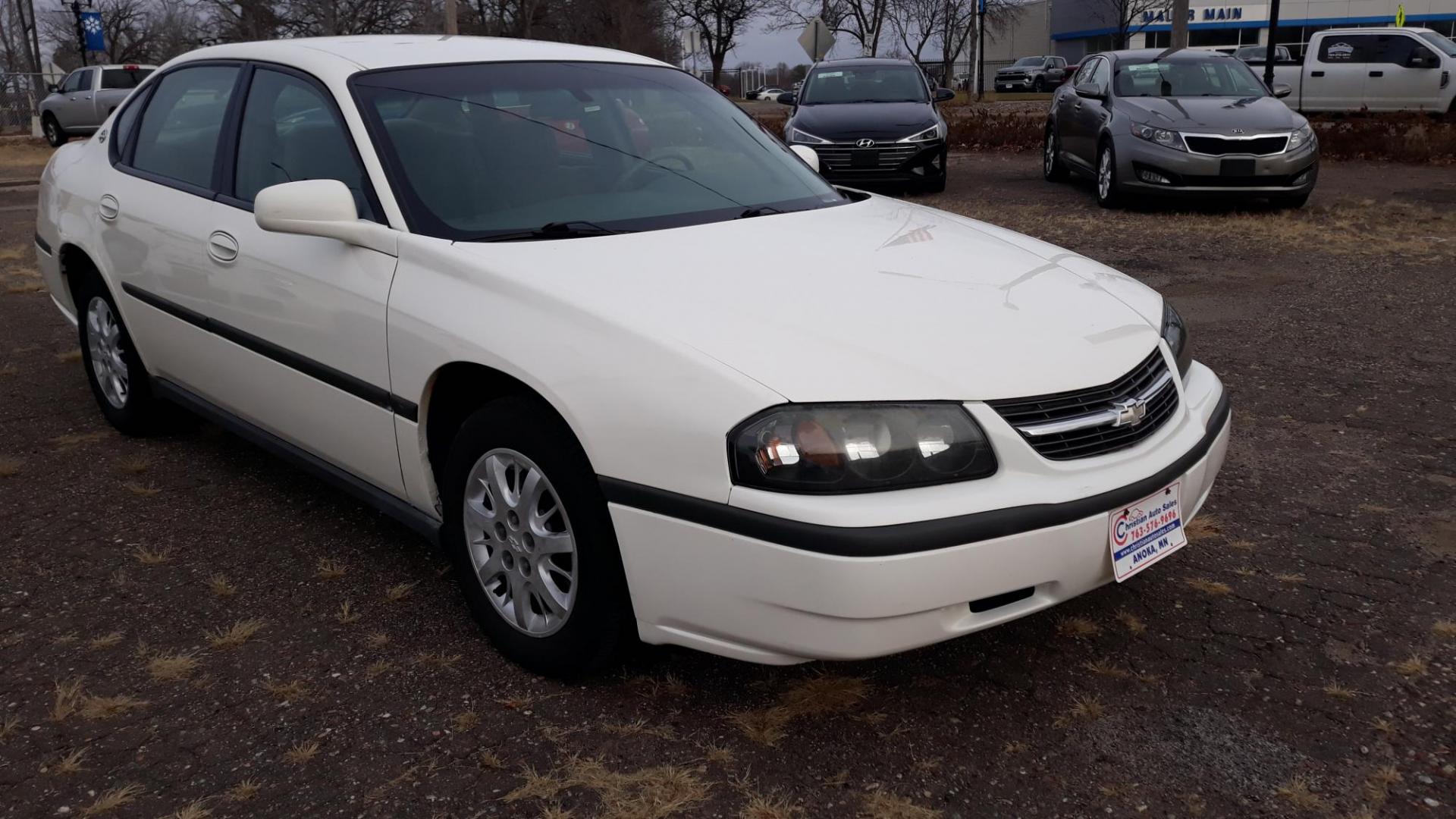 2005 WHITE /GRAY Chevrolet Impala Base (2G1WF52E759) with an 3.4L V6 OHV 12V engine, 4-Speed Automatic Overdrive transmission, located at 434 West Main Street, Anoka, MN, 55303, (763) 576-9696, 45.201759, -93.396706 - 2005 CHEVROLET IMPALA, Air Conditioning; Power Windows; Power Locks; Power Steering; Tilt Wheel; AM/FM Cassette; AM/FM CD; Pass Key Security; Daytime Running Lights; Dual Front Air Bag; Active Belts; All Wheel ABS - Photo#2