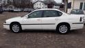 2005 WHITE /GRAY Chevrolet Impala Base (2G1WF52E759) with an 3.4L V6 OHV 12V engine, 4-Speed Automatic Overdrive transmission, located at 434 West Main Street, Anoka, MN, 55303, (763) 576-9696, 45.201759, -93.396706 - 2005 CHEVROLET IMPALA, Air Conditioning; Power Windows; Power Locks; Power Steering; Tilt Wheel; AM/FM Cassette; AM/FM CD; Pass Key Security; Daytime Running Lights; Dual Front Air Bag; Active Belts; All Wheel ABS - Photo#7