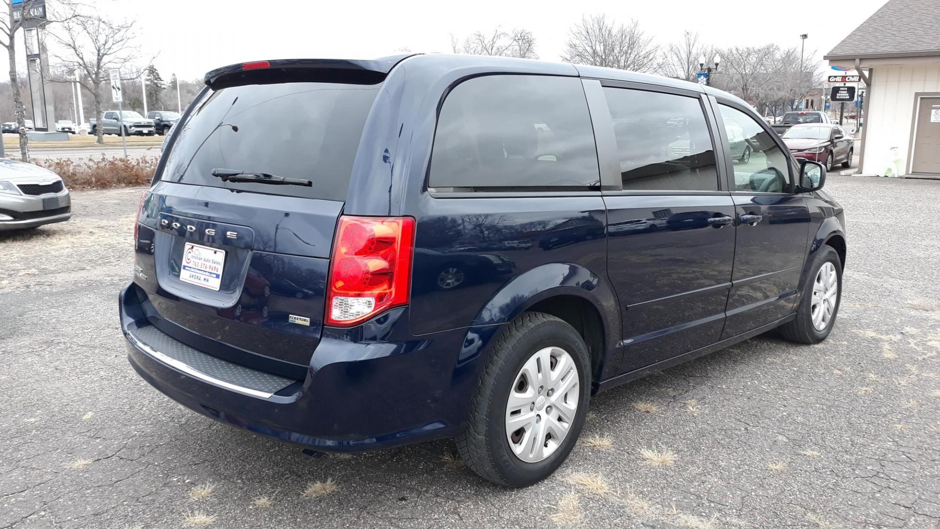 2014 Blue /TAN Dodge Grand Caravan SE (2C4RDGBG5ER) with an 3.6L V6 DOHC 24V engine, 6-Speed Automatic transmission, located at 434 West Main Street, Anoka, MN, 55303, (763) 576-9696, 45.201759, -93.396706 - Photo#4