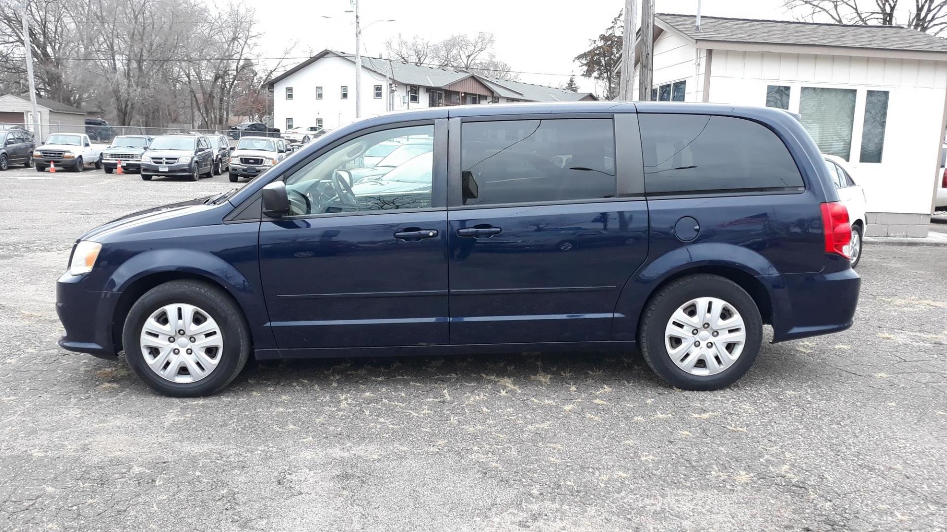 2014 Blue /TAN Dodge Grand Caravan SE (2C4RDGBG5ER) with an 3.6L V6 DOHC 24V engine, 6-Speed Automatic transmission, located at 434 West Main Street, Anoka, MN, 55303, (763) 576-9696, 45.201759, -93.396706 - Photo#6