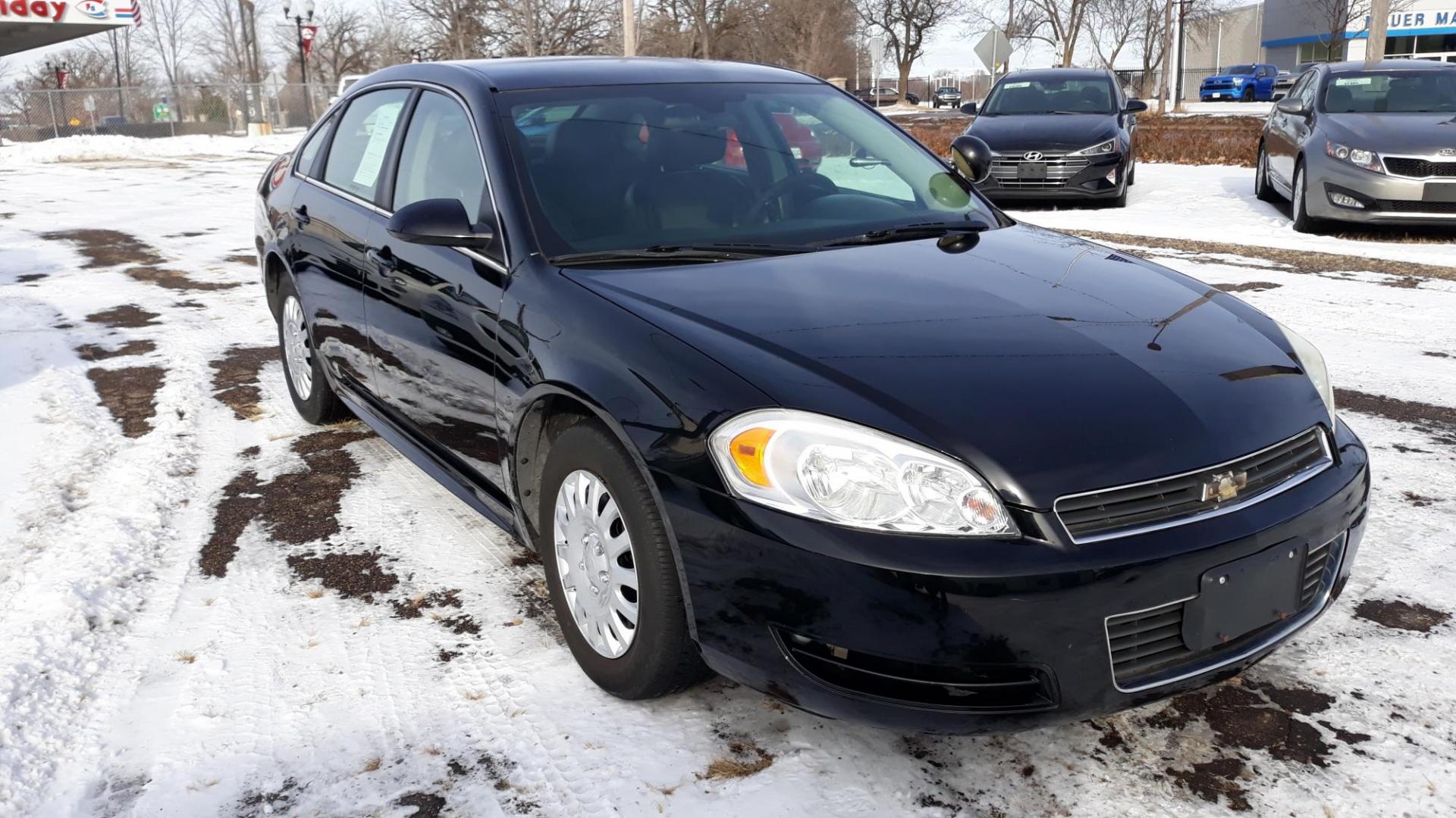 2011 BLACK /BLACK Chevrolet Impala Police Cruiser (2G1WD5EM5B1) with an 3.9L V6 OHV 16V FFV engine, 4-Speed Automatic Overdrive transmission, located at 434 West Main Street, Anoka, MN, 55303, (763) 576-9696, 45.201759, -93.396706 - 2011 CHEV IMPALA POLICE,3.9V6, Air Conditioning; Power Windows; Power Locks; Power Steering; Tilt Wheel; AM/FM CD; Sentry Key; Keyless Entry; Daytime Running Lights; Dual Airbags Front Head and Side; Active Seatbelts; Passenger Airbag Sensor; All Wheel ABS - Photo#2