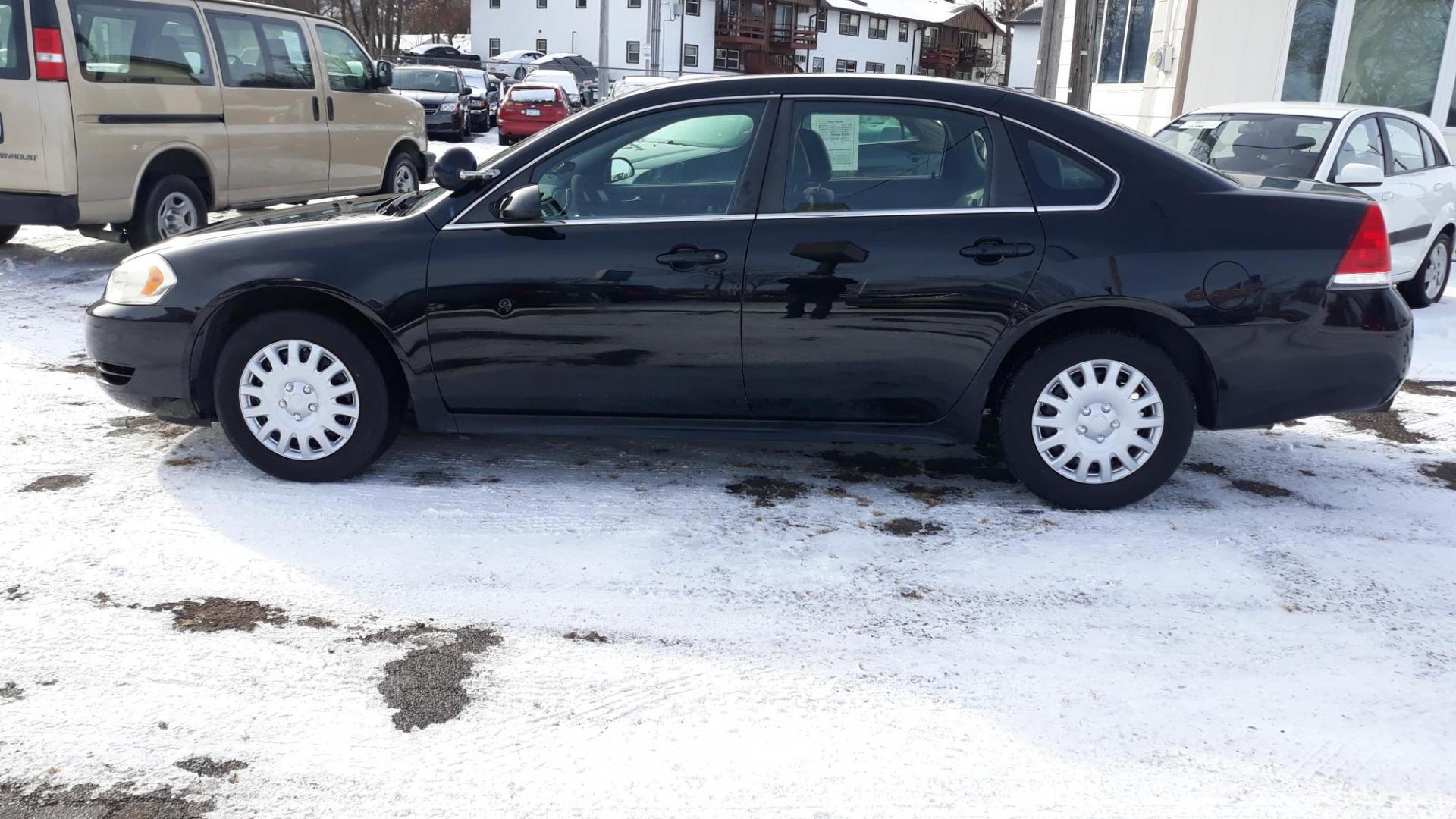 2011 BLACK /BLACK Chevrolet Impala Police Cruiser (2G1WD5EM5B1) with an 3.9L V6 OHV 16V FFV engine, 4-Speed Automatic Overdrive transmission, located at 434 West Main Street, Anoka, MN, 55303, (763) 576-9696, 45.201759, -93.396706 - 2011 CHEV IMPALA POLICE,3.9V6, Air Conditioning; Power Windows; Power Locks; Power Steering; Tilt Wheel; AM/FM CD; Sentry Key; Keyless Entry; Daytime Running Lights; Dual Airbags Front Head and Side; Active Seatbelts; Passenger Airbag Sensor; All Wheel ABS - Photo#6