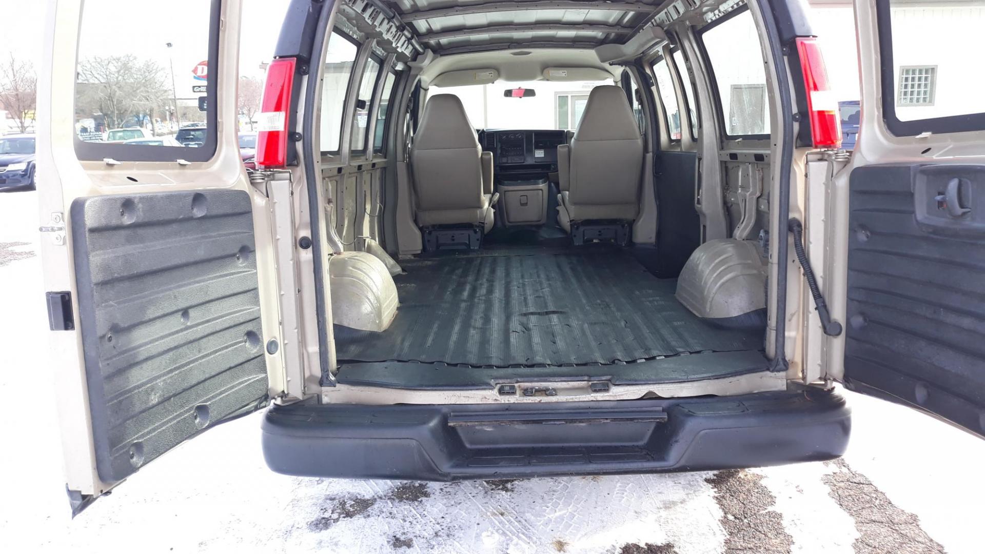 2006 TAN /TAN Chevrolet Express 1500 Cargo (1GCFG15X261) with an 4.3L V6 OHV 12V engine, 4-Speed Automatic Overdrive transmission, located at 434 West Main Street, Anoka, MN, 55303, (763) 576-9696, 45.201759, -93.396706 - 2006 CHEV G1500, ONE OWNER, 0-ACCIDENTS 62,620 ACTUAL MILES. Air Conditioning; Available; Power Steering; Tilt Wheel; AM/FM; AM/FM CD; AM/FM Cassette/CD; Passive engine immobilizer; Daytime Running Lights; Dual Front Air Bag; Active Belts; Van Cab; All Wheel ABS - Photo#11