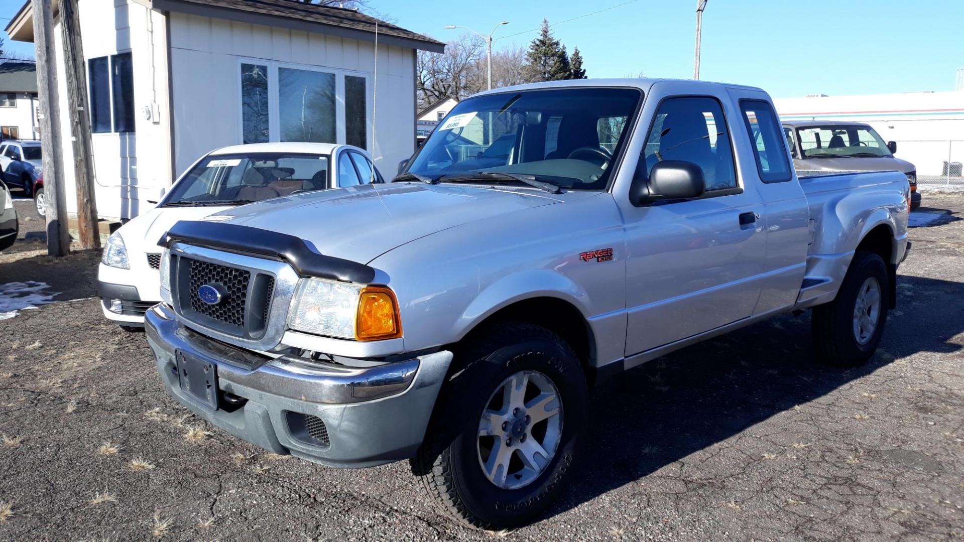 2004 SILVER /GRAY Ford Ranger XLT SuperCab 2-Door 4WD (1FTZR15E04P) with an 4.0L V6 SOHC 12V engine, AUTO transmission, located at 434 West Main Street, Anoka, MN, 55303, (763) 576-9696, 45.201759, -93.396706 - 2004 FORD RANGER X-CAB XLT 4X4 STEP SIDE, Tilt Wheel; AM/FM; AM/FM CD; Pass Key Security; Dual Front Airbags; Active Seatbelts; Passenger Airbag Sensor; Extended Cab; Regular Bed; ABS; 1/2 Ton - Photo#0